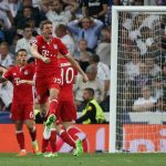 Bayern Munich's Thomas Muller celebrates after Real Madrid's Sergio Ramos scores an own goal and the second goal for Bayern Munich